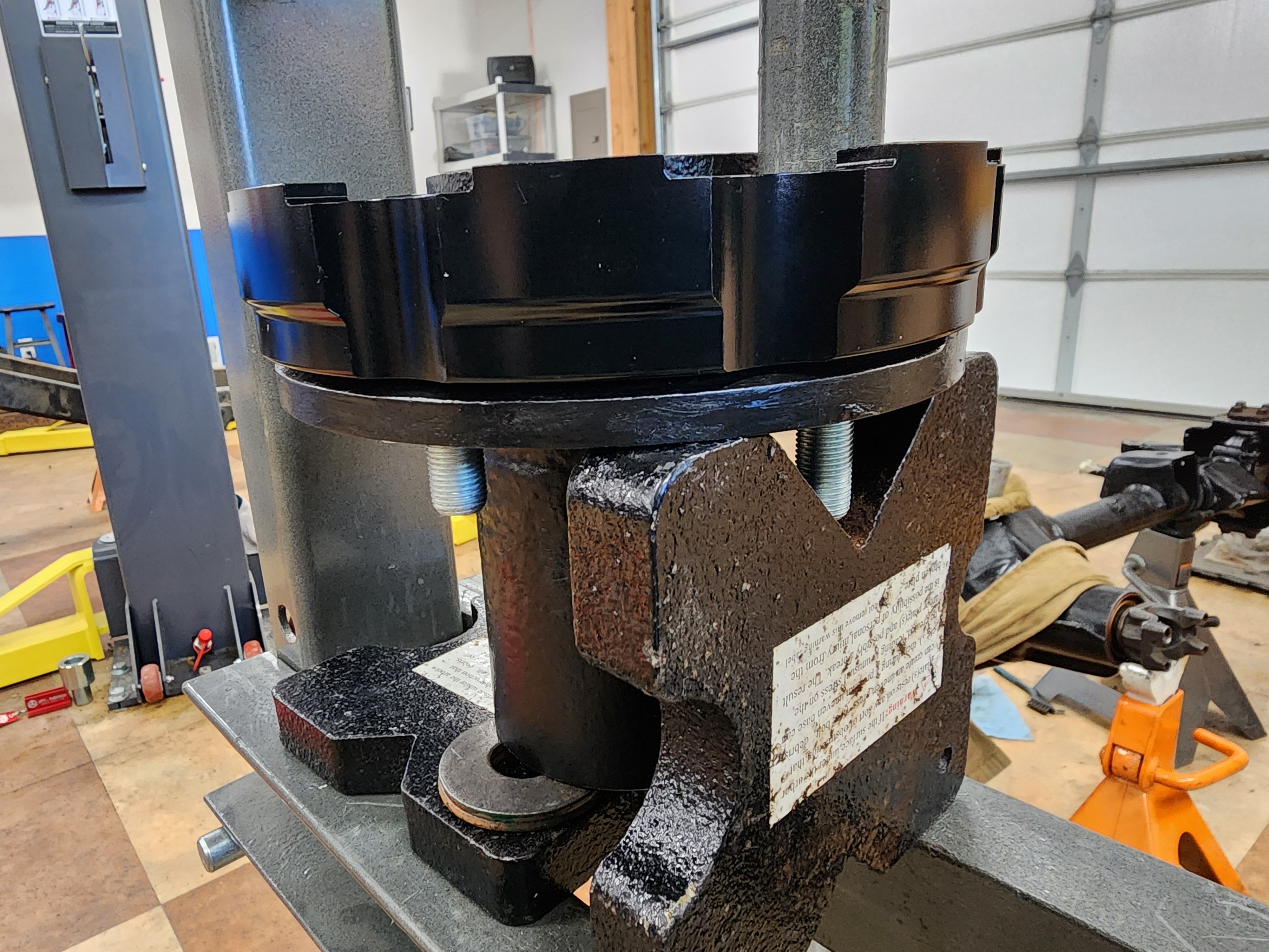 Aaand pressing in the new ones, but with a fancy rotor...thing